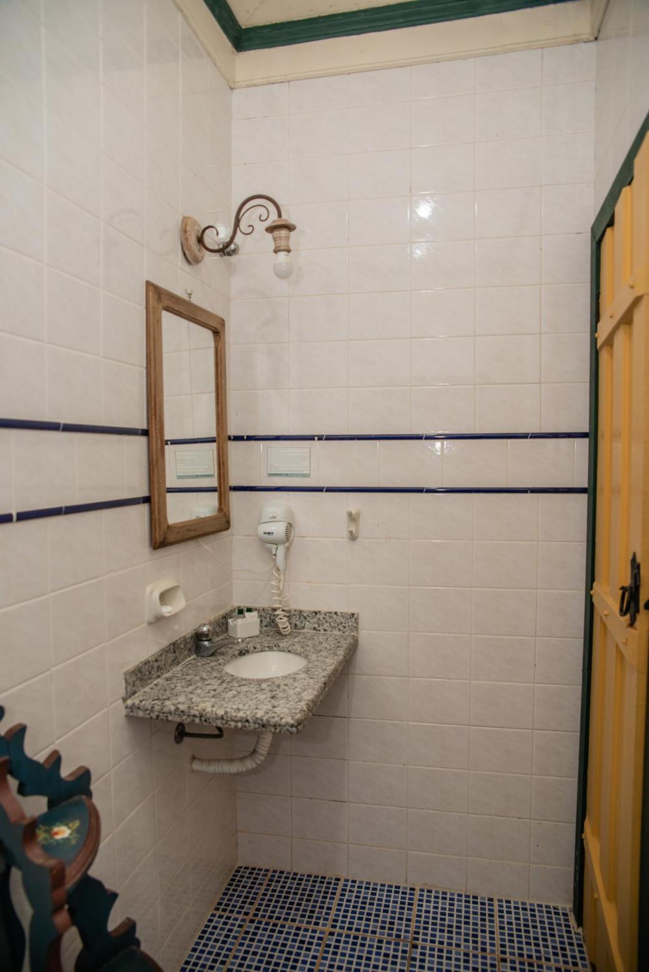 Quarto Triplo com Vista do Jardim